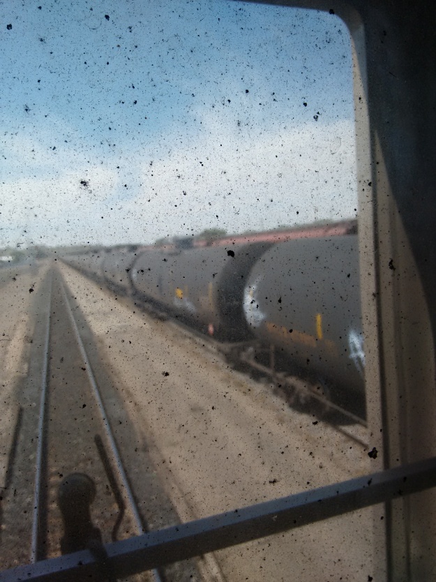 oil train through dirty window